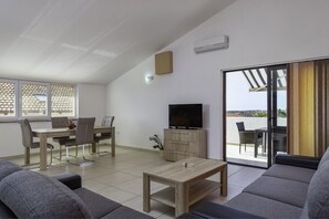 Appartamento (A1) | Area soggiorno | TV a schermo piatto