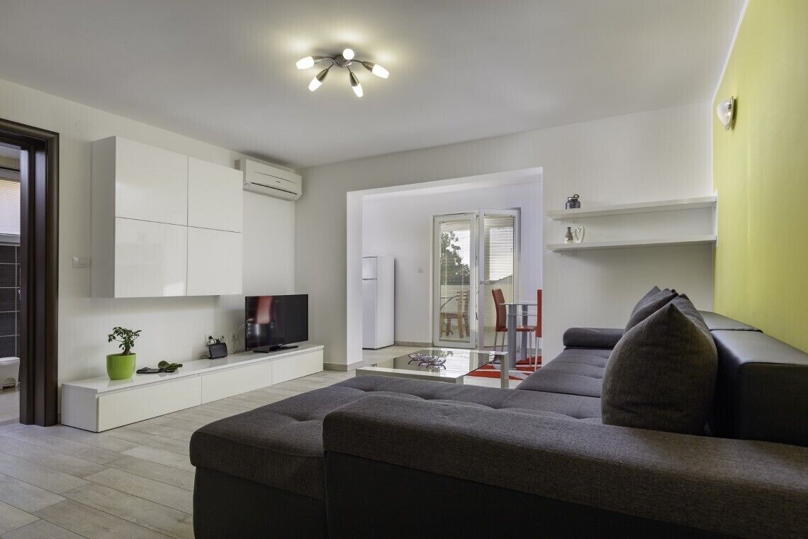 Apartment (A5) | Living area | Flat-screen TV