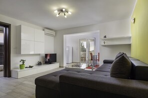 Appartamento (A5) | Area soggiorno | TV a schermo piatto