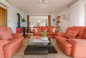 Departamento Confort, 1 habitación, vista al mar | Sala de estar | Televisión de pantalla plana 
