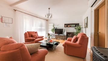 Comfort Apartment, 1 Bedroom, Sea View | Living area | Flat-screen TV