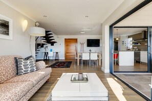 Villa | Living area | 43-inch flat-screen TV with satellite channels, LCD TV, fireplace