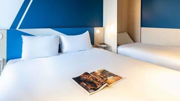 Standard Room, Multiple Beds | Desk, blackout drapes, soundproofing, free WiFi