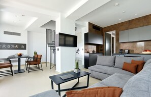 Departamento ejecutivo, 2 habitaciones | Cocina privada | Refrigerador, horno, parrilla de estufa y cafetera de espresso 