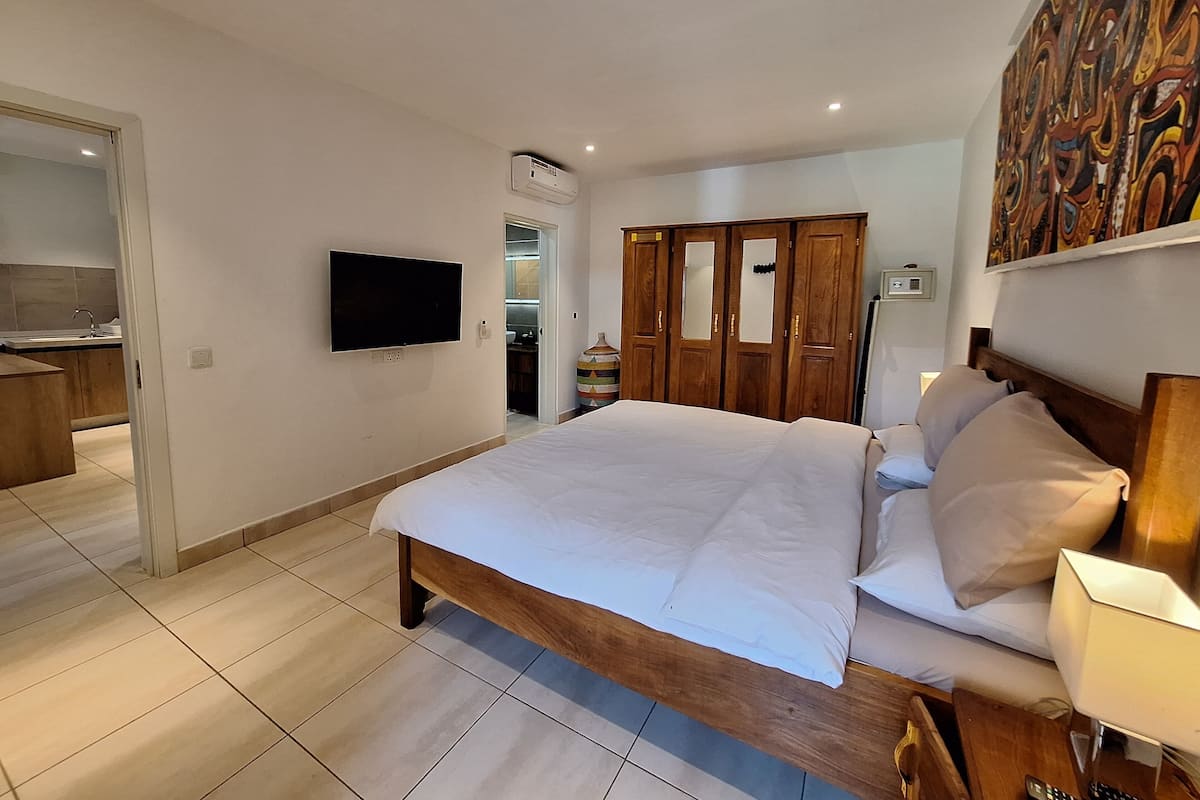 Departamento Confort, 2 habitaciones, balcón, vista a la alberca | 1 habitación, decoración personalizada y muebles diferentes