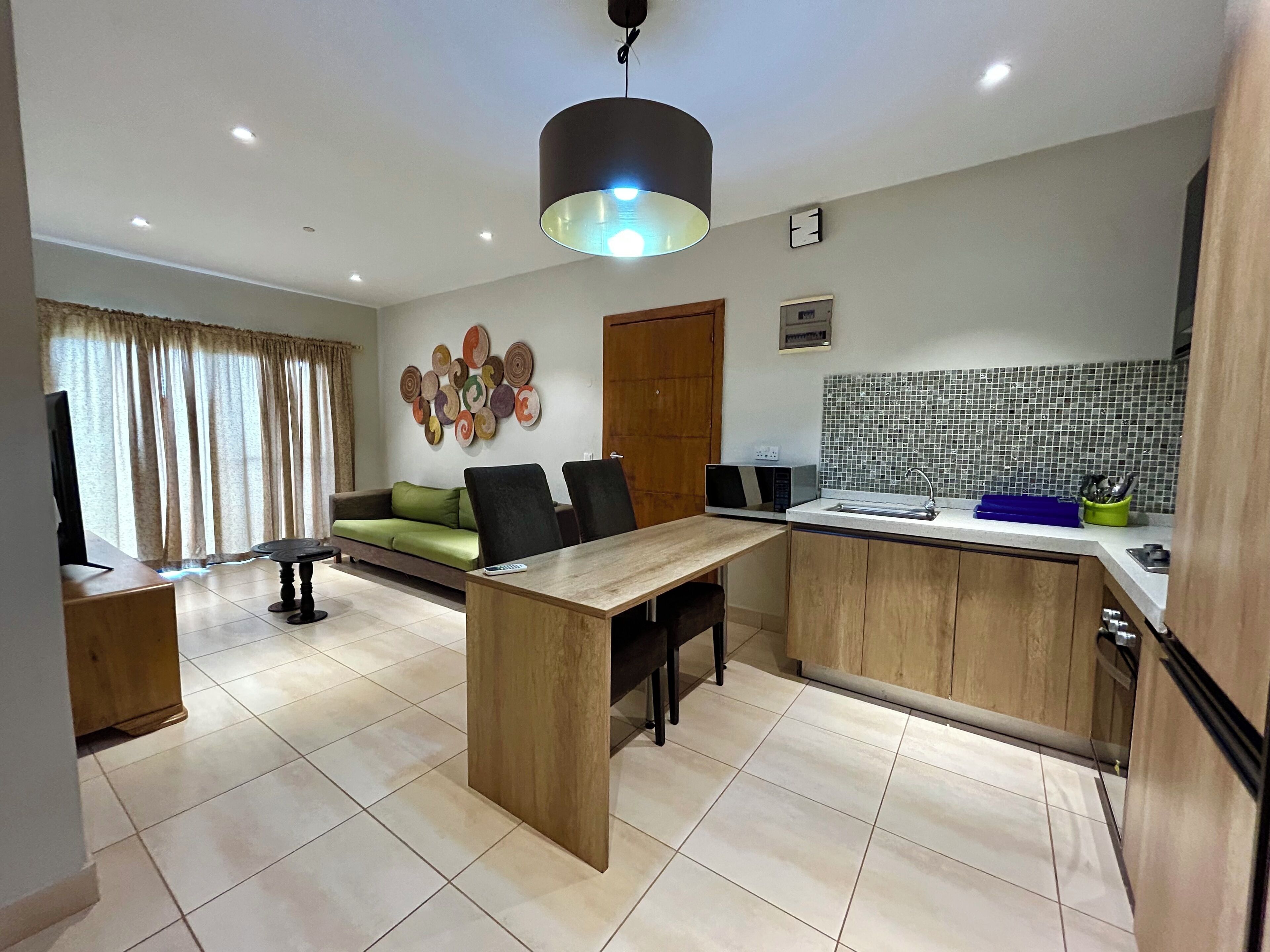 Comfort Apartment, Balcony, Pool View (F10- Top Floor) | Individually decorated, individually furnished, iron/ironing board