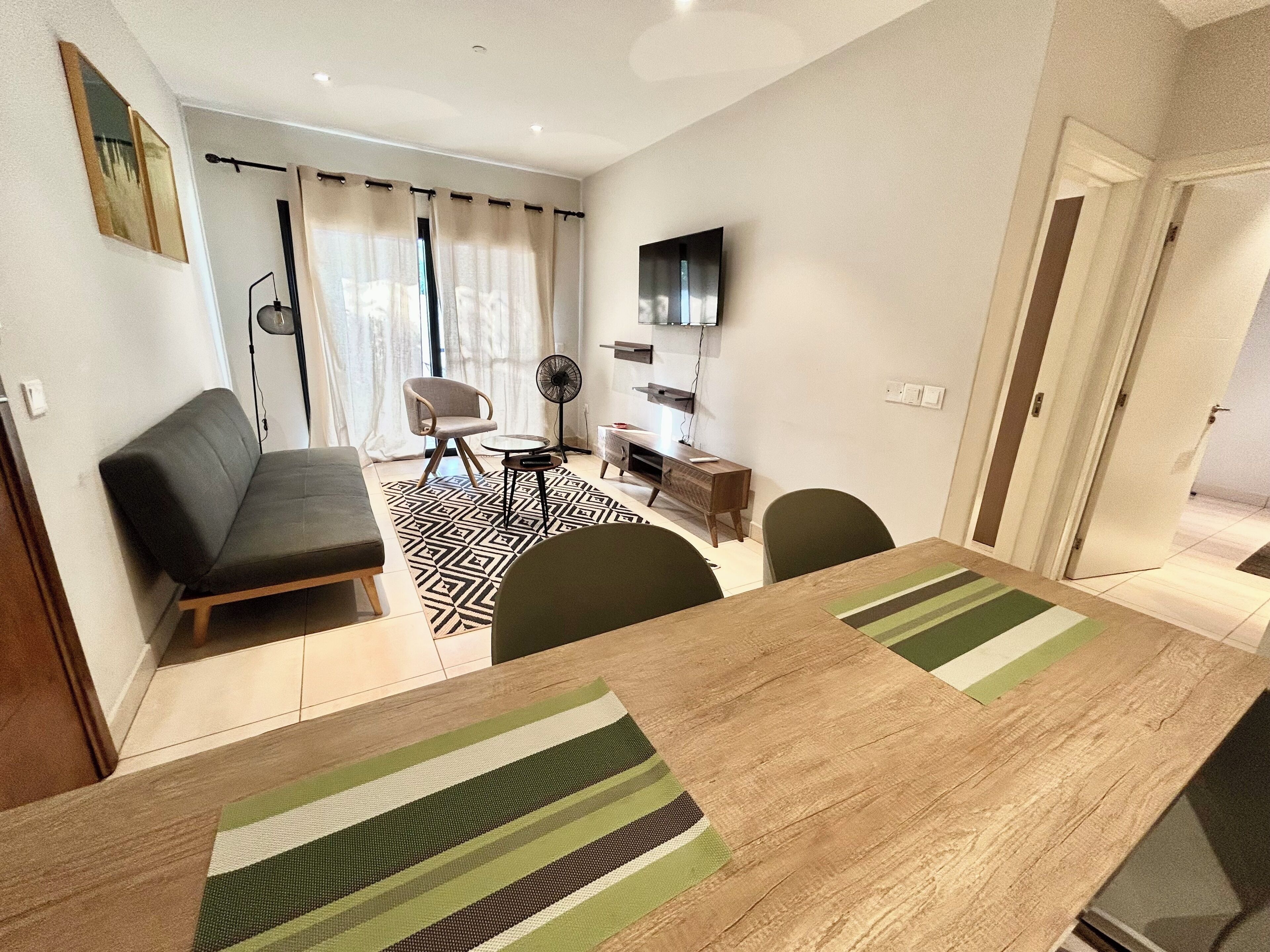 Standard Apartment, Patio, Garden View (B3) | Living area | Smart TV