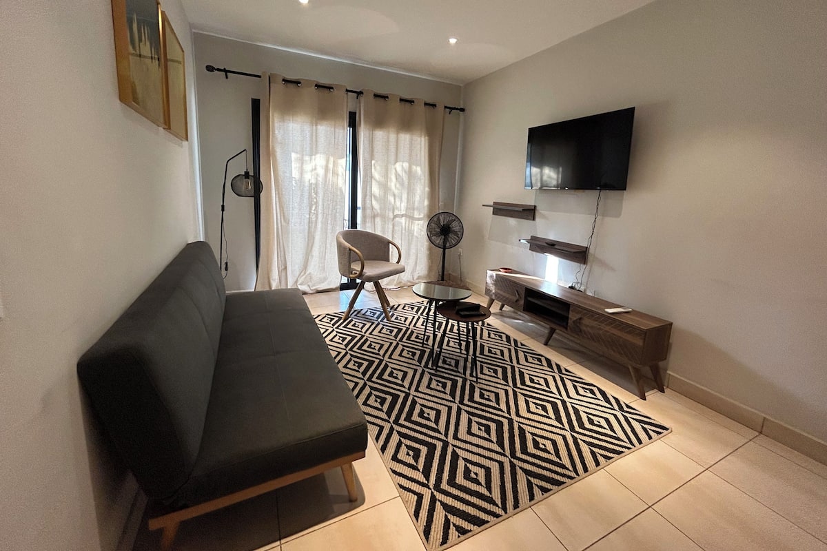 Standard Apartment, Patio, Garden View (D3) | Living area | Smart TV