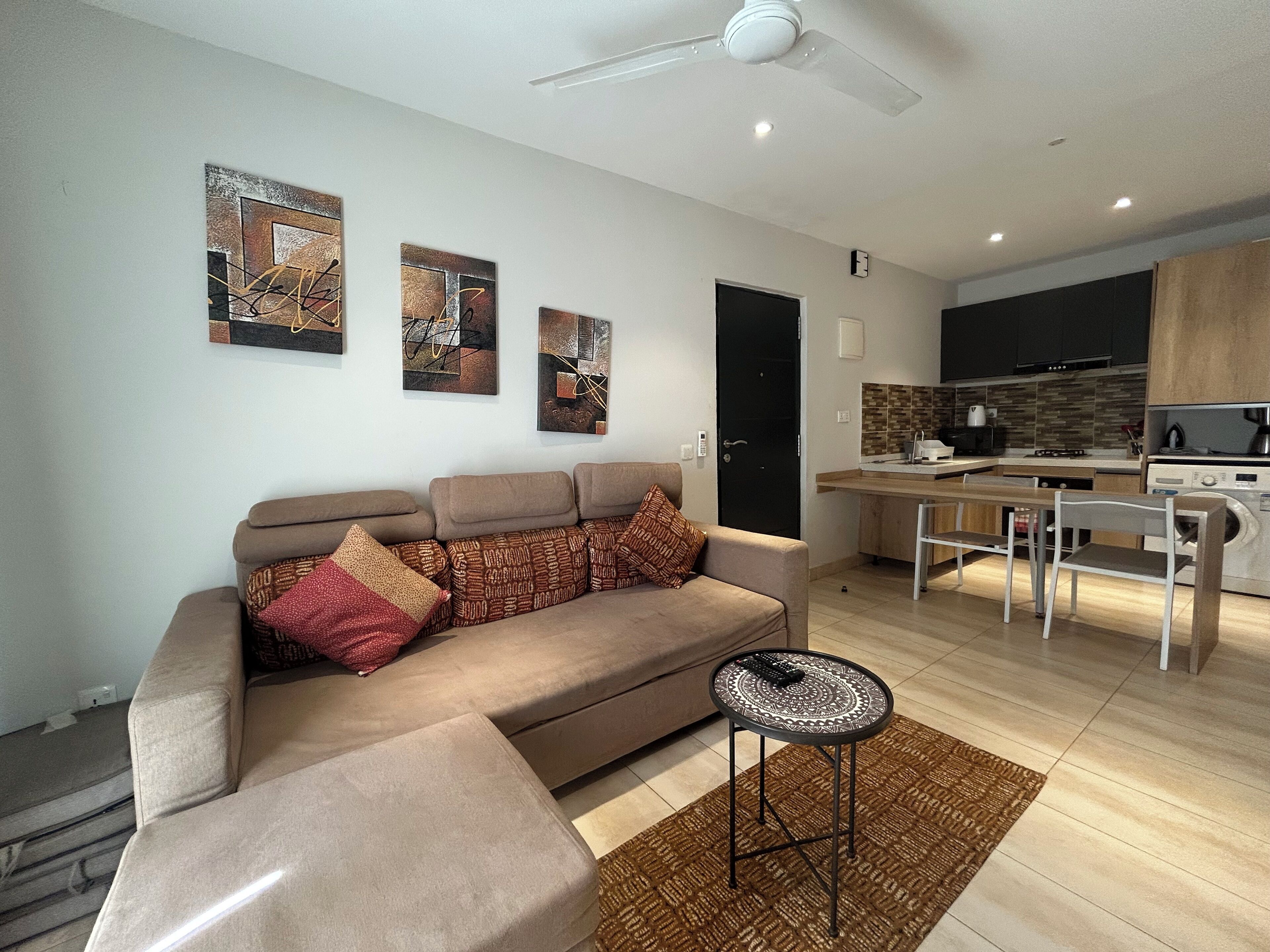 Comfort Apartment, 1 Bedroom, Balcony, Park View (E15-Top Floor) | Living area | Smart TV