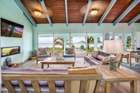 Smart TV, fireplace, computer monitors. Modern Four Bedroom Home ON THE BEACH in Grand Bahama