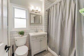 Shower, hair dryer, shampoo