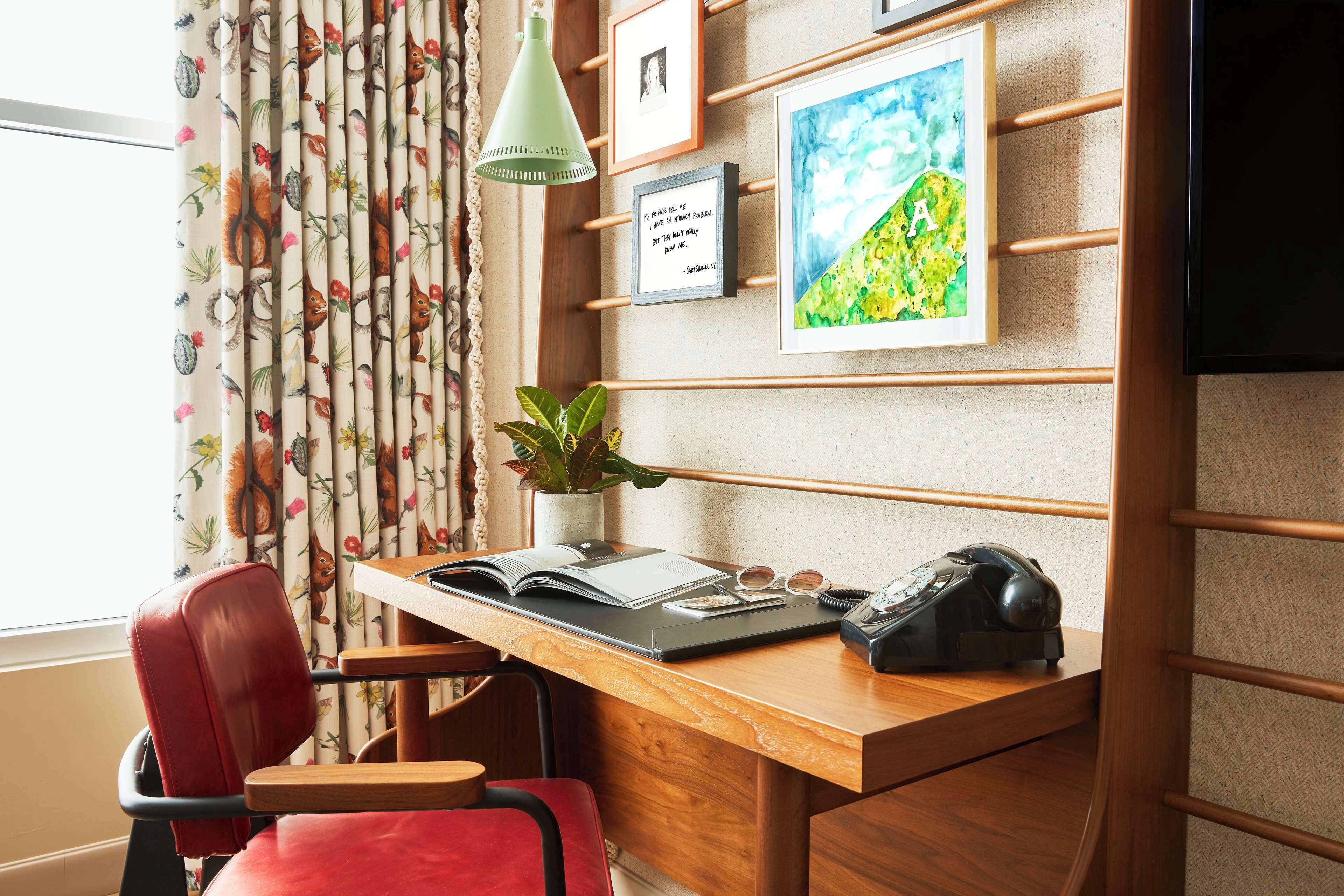 room, 2 queen beds (graduate) | in-room safe, individually decorated, individually furnished, desk