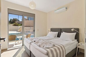 2 عدّة غرف نوم ومكواة/لوح كي وواي فاي مجانًا وملاءات أسرّة