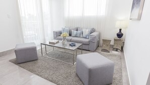 Apartment, 2 Bedrooms | Living area | TV - Soha suites I A04 (Santiago de los Caballeros)