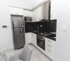 Apartment, 2 Bedrooms | Private kitchen | Fridge, microwave, oven, stovetop - Soha suites I A12 (Santiago de los Caballeros)