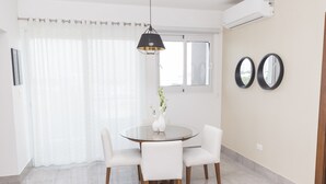 Standard Room | In-room dining - Soha suites I C07 (Santiago de los Caballeros)