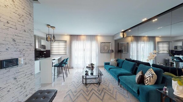 Appartement Luxe | Coin séjour | Télévision