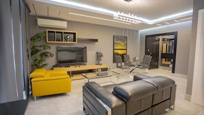 Luxe appartement | Woonruimte | Een flatscreentelevisie
