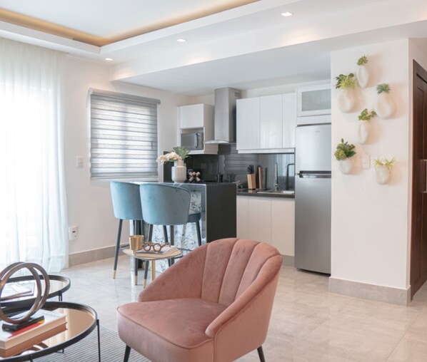 Exclusive-Apartment | Wohnbereich | Fernseher