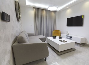 Luxury Apartment | Living area | TV
