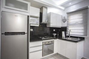 Business-Apartment | Eigene Küche | Kühlschrank, Mikrowelle, Ofen, Herdplatte