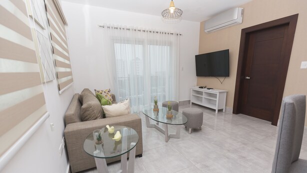 Comfort Apartment | Living area | TV - Soha suites II D12 (Santiago de los Caballeros)