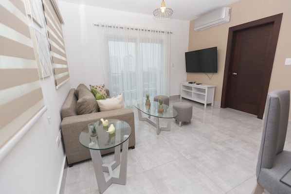 Appartement Confort | Coin séjour | Télévision