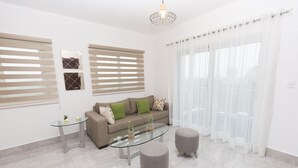 Comfort Apartment | Living room | TV - Soha suites II D12 (Santiago de los Caballeros)