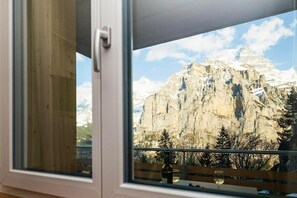 Enjoy breathtaking views of the snow-capped mountains from this room's window.