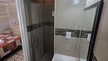 Combined shower/tub, hair dryer, towels, soap