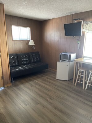 Cabin 3 - 1 Queen Bed | Living area | 28-inch flat-screen TV with cable channels, TV