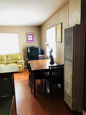 Cabin 11 - Deluxe 1 Queen, Full Kitchen | Living area | 28-inch flat-screen TV with cable channels, TV
