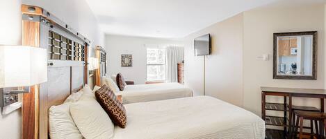 Ferros/tábuas de passar roupa, acesso à internet, roupa de cama