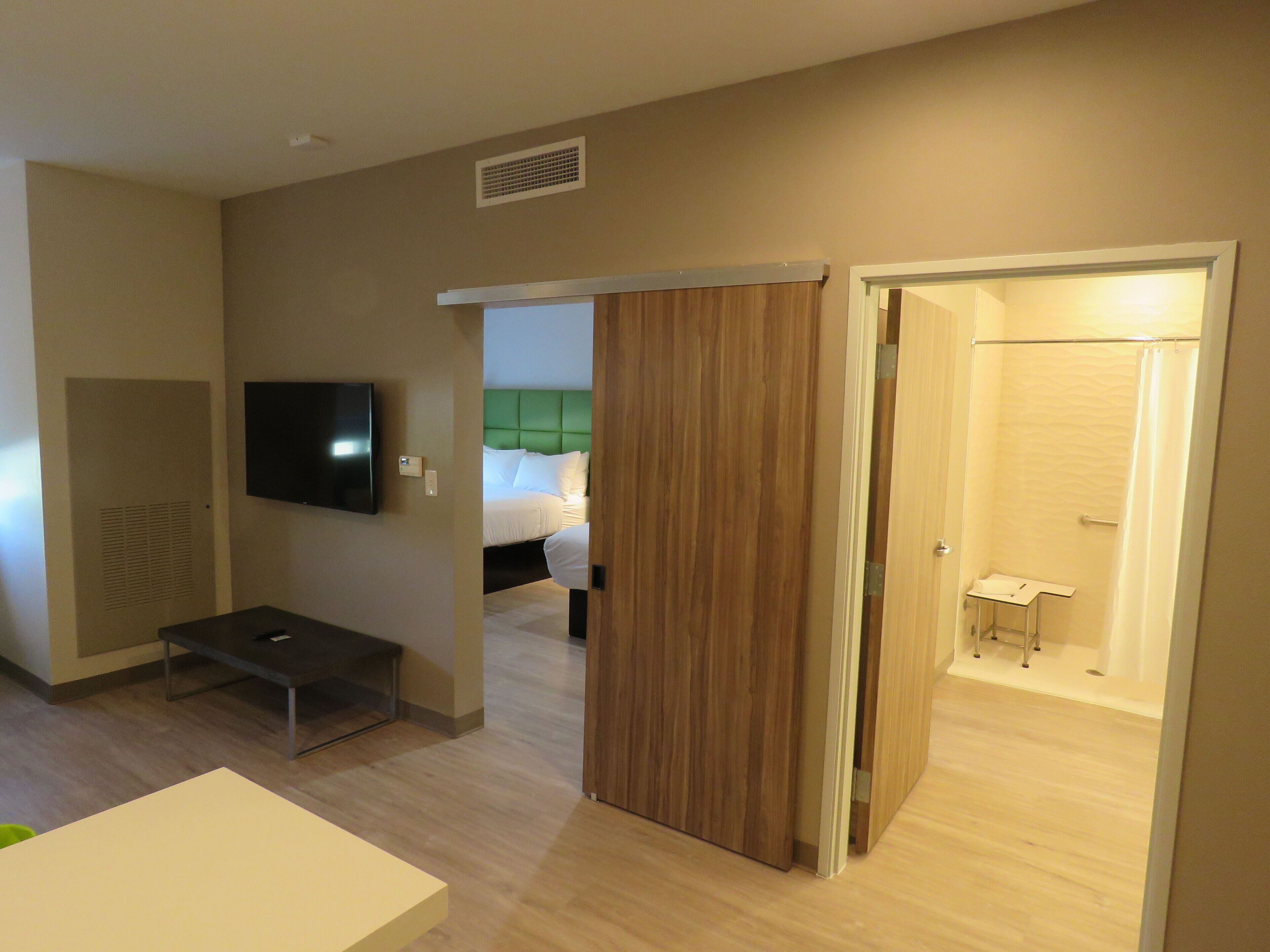 suite, 2 queen beds, accessible, non smoking (mobility) | bathroom | shower, hydromassage showerhead, designer toiletries, hair dryer