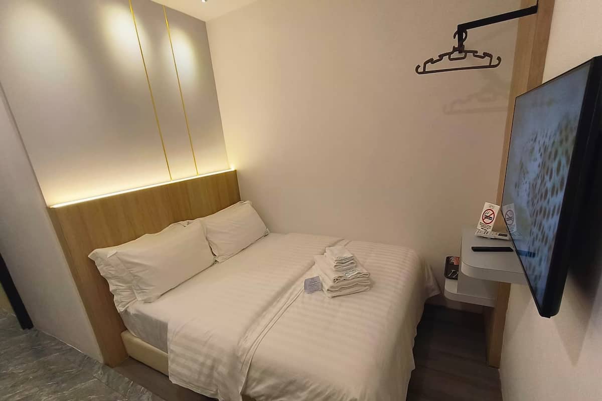 Habitación doble estándar, 1 cama matrimonial | 1 habitación, camas con efecto memoria y cortinas blackout