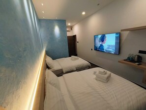 豪華三人房 | 記憶床墊、遮光布/窗簾、熨斗/熨衣板、免費無線上網