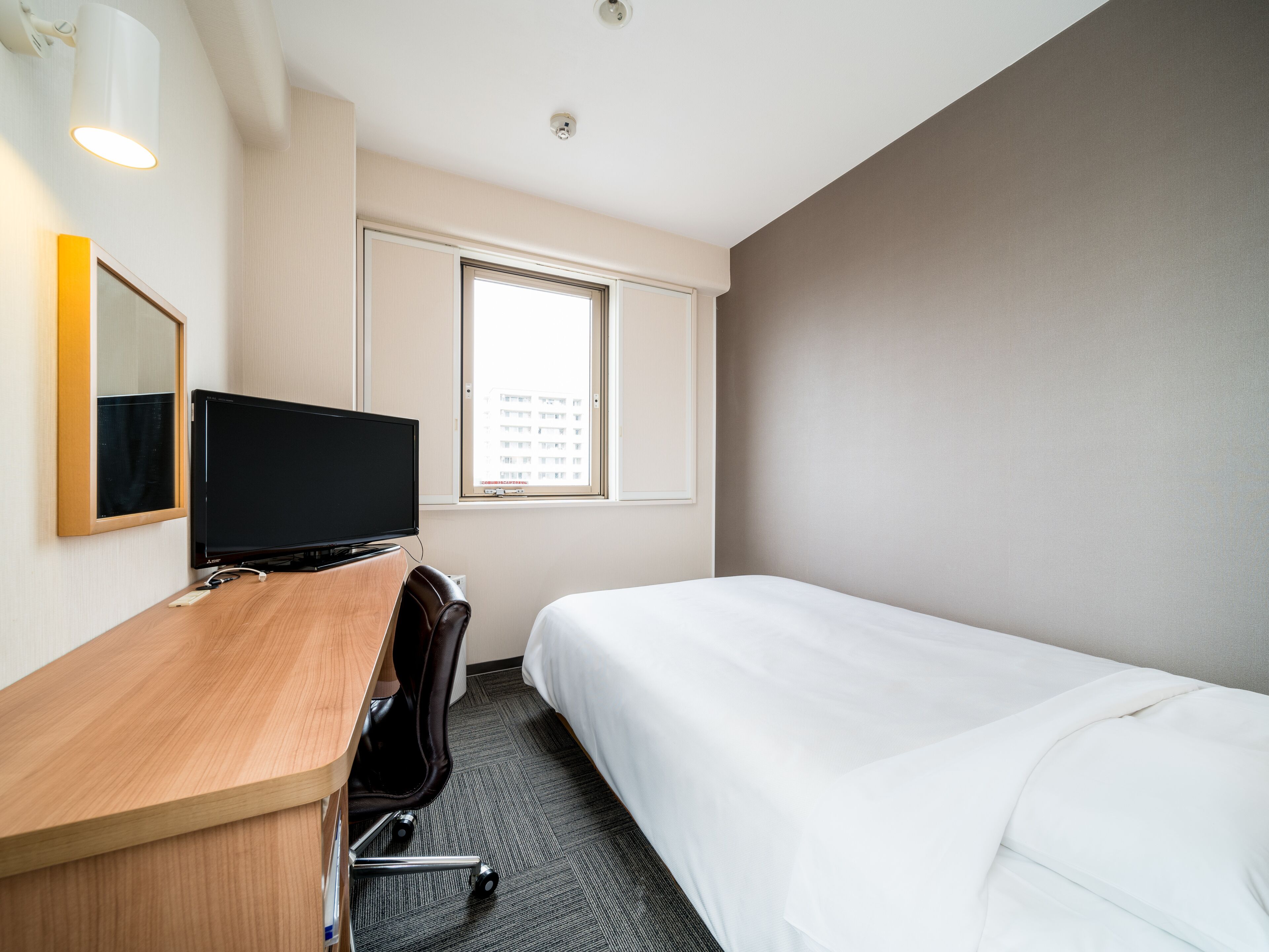 blackout curtains, iron/ironing board, free wifi, bed sheets