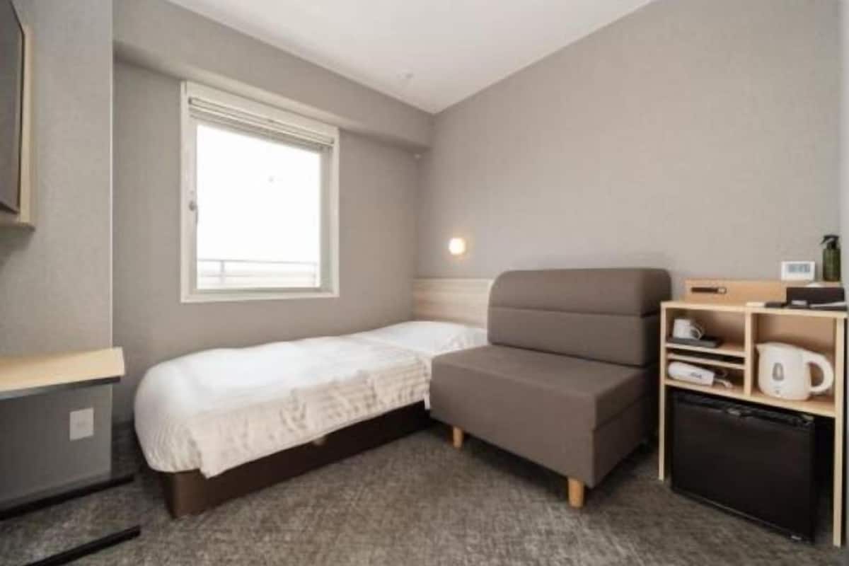 Desk, blackout drapes, soundproofing, iron/ironing board