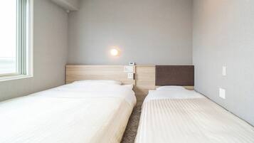 Basic Twin Room | Desk, blackout drapes, soundproofing, iron/ironing board