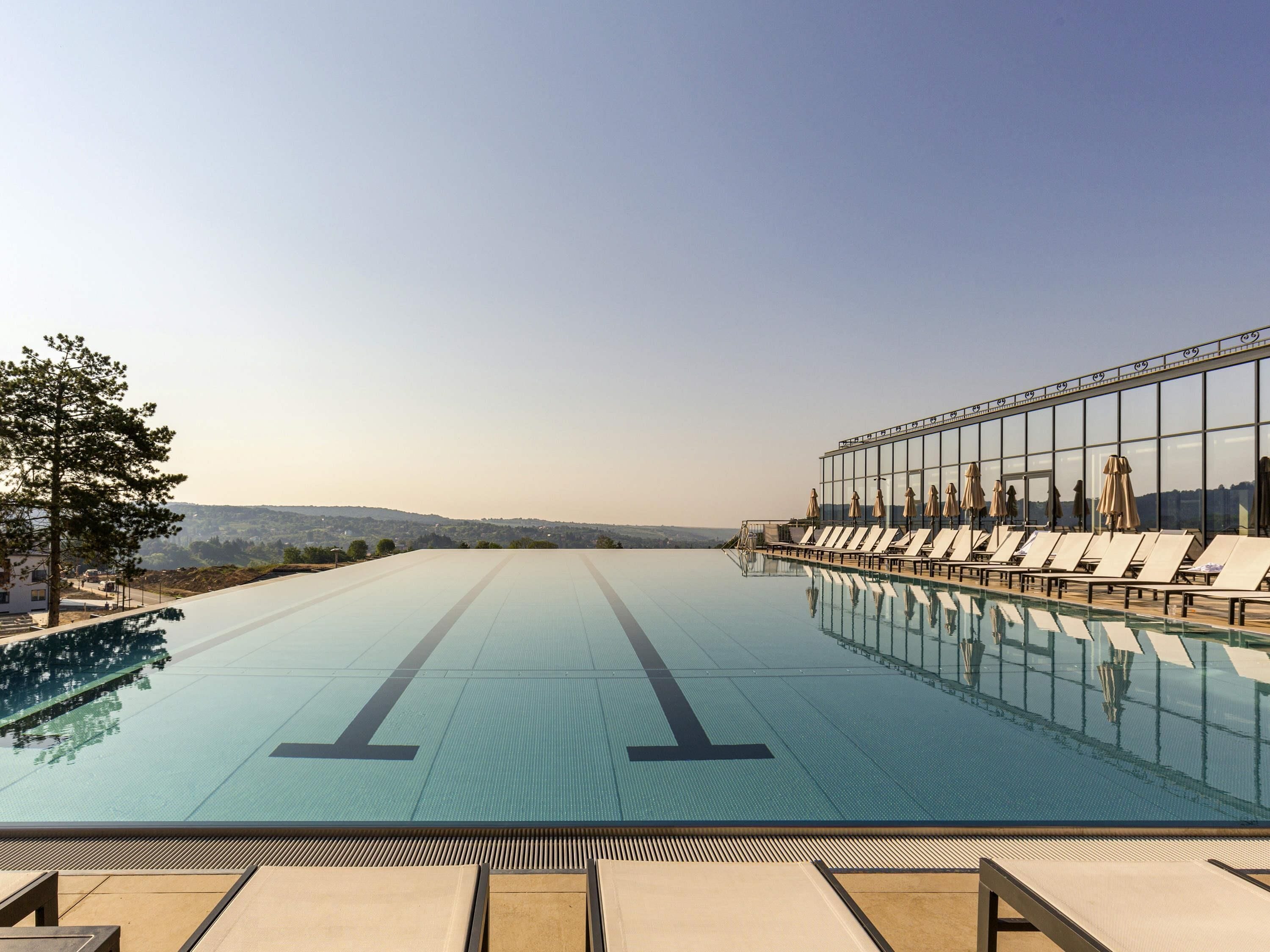 Indoor pool, seasonal outdoor pool, sun loungers, lifeguards on site