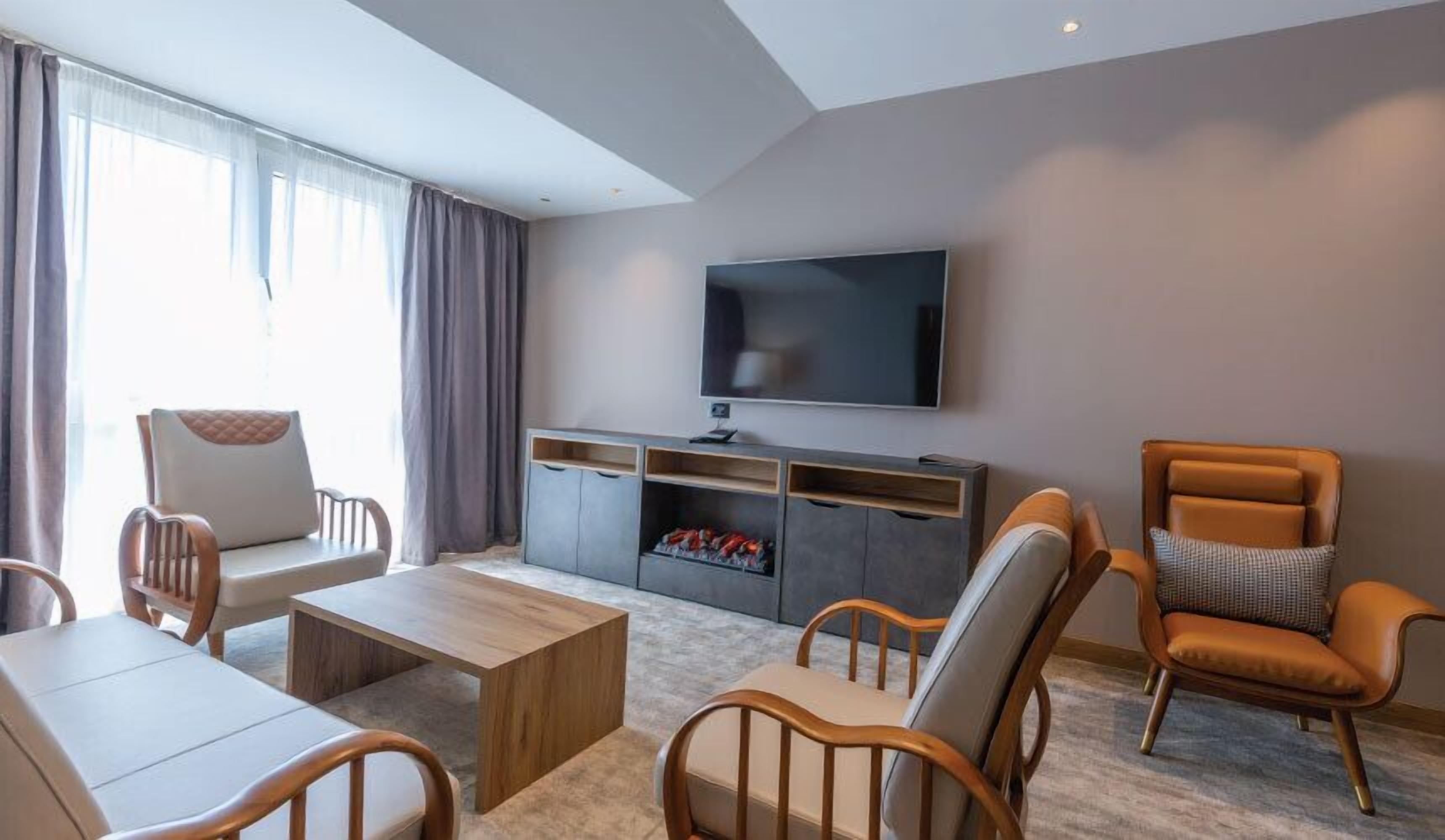 vrdnicka kula suite | living area | flat-screen tv