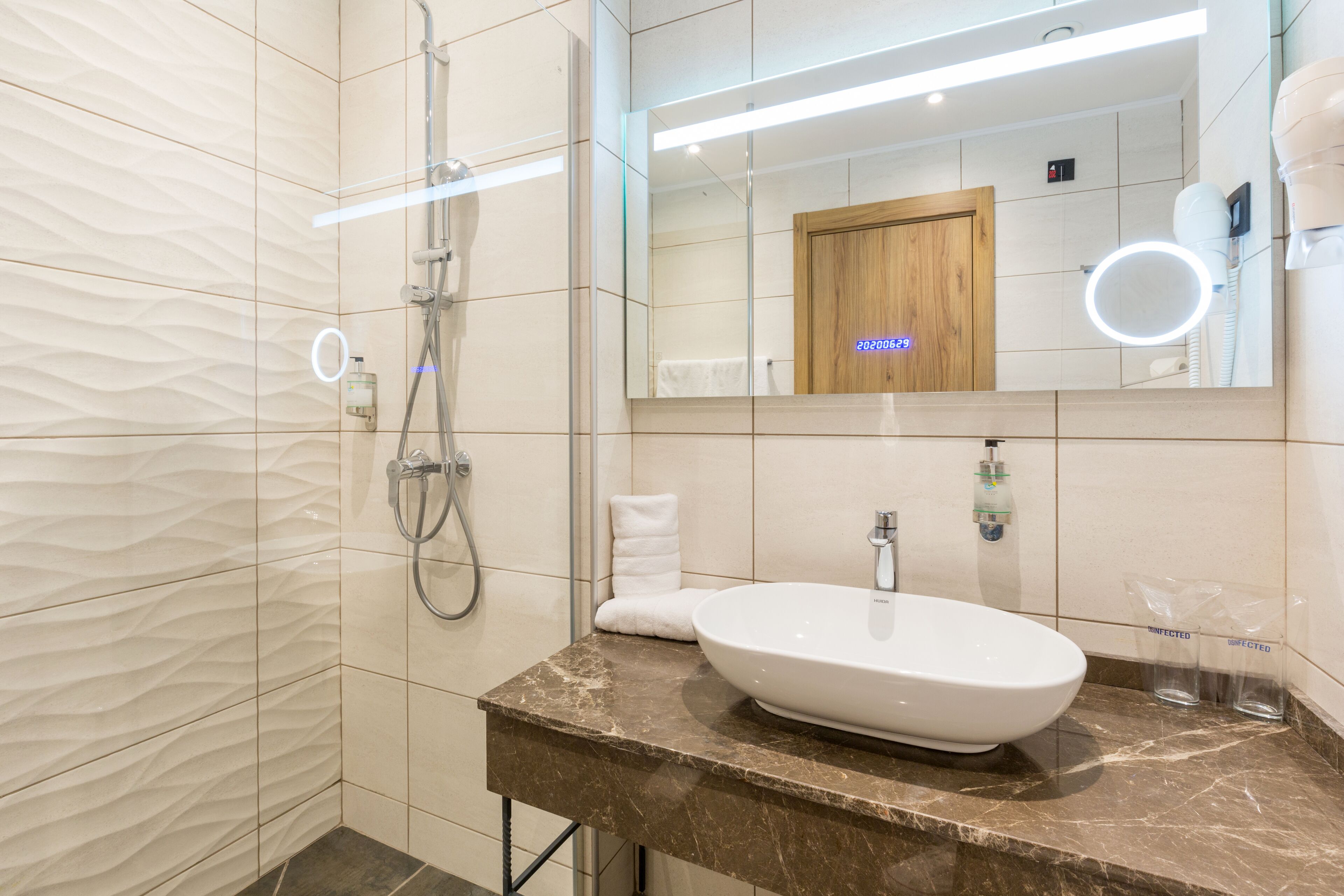superior apartment | bathroom | shower, eco-friendly toiletries, hair dryer, slippers