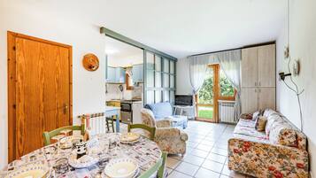 Family Apartment, Multiple Bedrooms (La Chimera 700m from sea) | Living area | 22-inch flat-screen TV with digital channels, TV