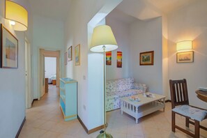 Family Apartment, Multiple Bedrooms, 2 Bathrooms, Sea Facing (La Fresia - Focette 100m from sea) | Living area | 21-inch TV with cable channels - La Fresia - Focette 100mt From Sea (Pietrasanta)