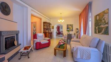 Family Villa, Multiple Bedrooms, Mountainside (Villa Clara few km from the sea) | Living area | 21-inch flat-screen TV with digital channels, TV, fireplace