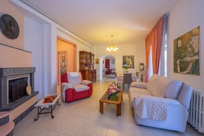 Family Villa, Multiple Bedrooms, Mountainside (Villa Clara few km from the sea) | Living area | 21-inch flat-screen TV with digital channels, TV, fireplace