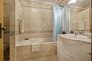 Bañera y secador de pelo