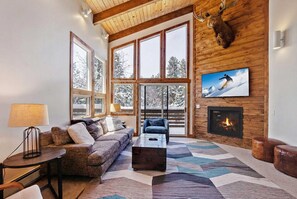 Téléviseur à écran plat, foyer, jeux vidéo, livres