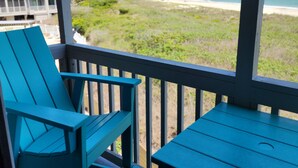 A balcony with a view of a beach and ocean. - April's Retreat - Oceanfront! Special rates for July 4-11! (Atlantic Beach)