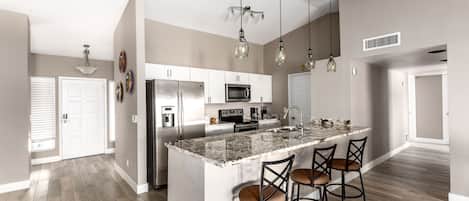 House (4 Bedrooms) | Private kitchen | Oven, stovetop, dishwasher, cookware/dishes/utensils